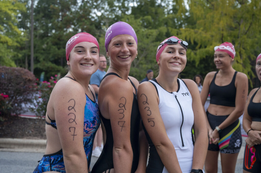 Participants smile before the start of the She Tris triathlon Sept. 14, 2025, in Chapel Hill. This women’s-only race encourages newcomers to the sport and builds community through friendly competition.