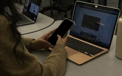 Teen using her phone. Decorative image